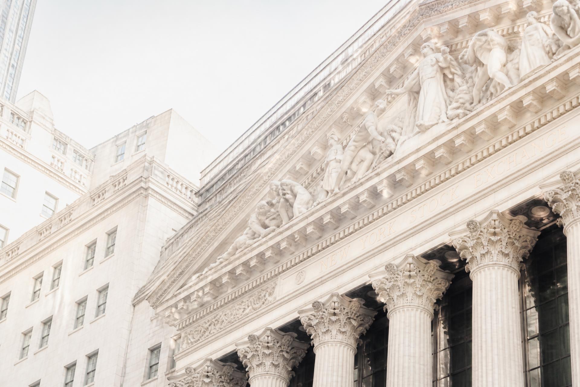 The New York Stock Exchange neoclassical facade in soft daylight